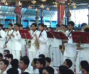 HIS BRASS BAND PLAYS ON CHRISTMAS
